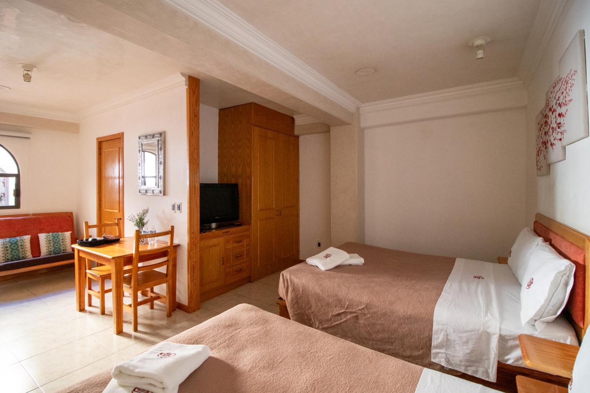 Suites Sevilla Puebla Buitenkant foto